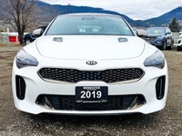 The 2019 Kia Stinger GT in an eye-catching White color with AWD drive technology offers remarkable h... (image 2)