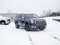 The 2020 GMC Yukon Denali is a premium full-size SUV that delivers powerful performance, upscale com... (image 1)