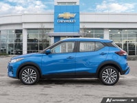 Command attention in this former daily rental vibrant Electric Blue Metallic 2024 Nissan Kicks SV, e... (image 1)