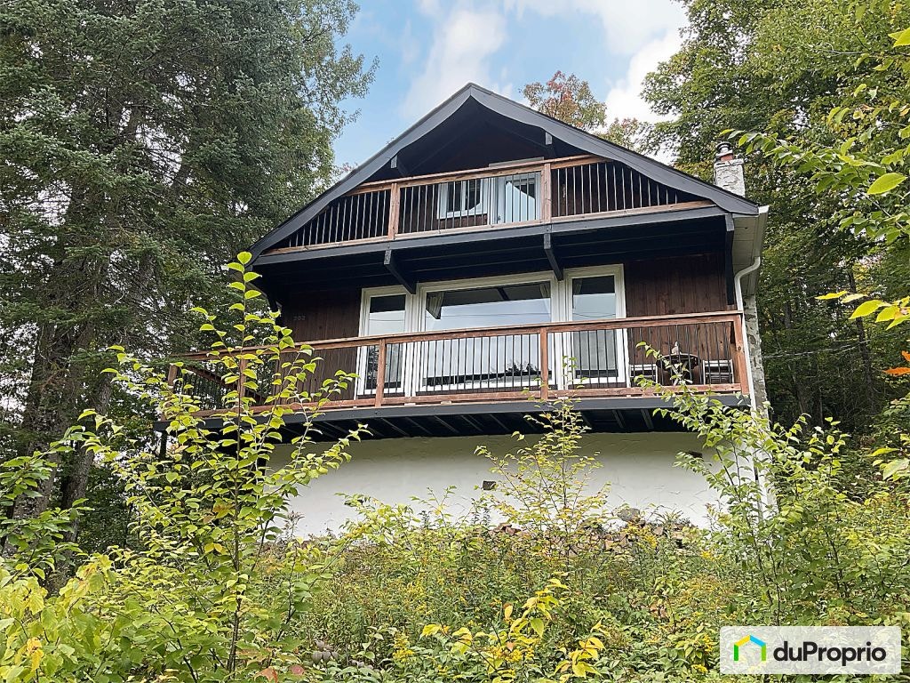 $449,000 - Cottage for sale in St-Adolphe-D'Howard — photo 1