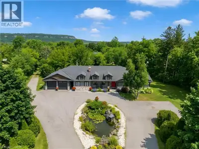 Bikes circling the pond, kids in the backyard and Mount Nemo views to welcome you home. Set on just...