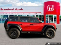 Unleash the beast within. This 2022 Ford Bronco Raptor, a Code Orange convertible with a Black Onyx... (image 6)