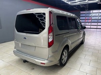 Experience the elegance and sophistication of the gold 2015 Ford Transit Connect Wagon Titanium with... (image 8)