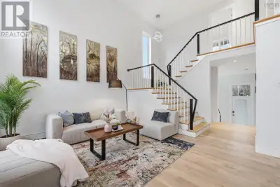Welcome to this modern-designed home located in one of the most desirable neighborhoods in West Bedf...
