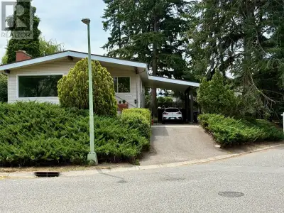 Welcome to this 4 bedroom home right in the heart of Glenmore! Featuring a legal 1 bedroom suite whi...