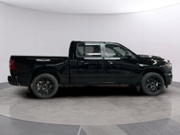Drive into the future with the stunning 2026 Ram 1500 Sport 4x4 Crew Cab, wrapped in a sleek black e... (image 5)