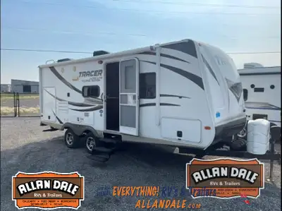 The Tracer 230FBS travel trailer by Prime Time Manufacturing offers a single slide and a rear bath.A...
