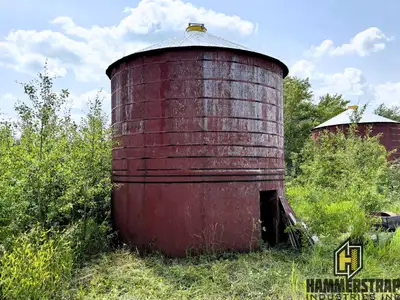 Wooden Grain Bins- 2 to choose from 14 Ft diameter 1300 bu capacity Hopper bottom Metal roof Westeel...