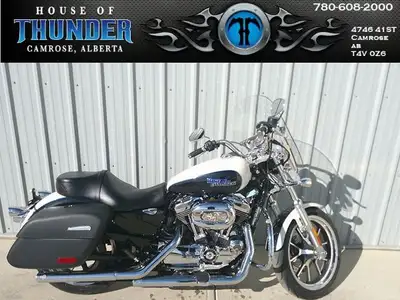 Looking for touring comfort without the bulk of a full dresser? This 2014 XL1200T gives you the spir...
