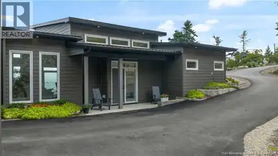 Welcome to your dream retreat on 3.6 acres of breathtaking waterfront in Beaver Harbour. This modern...