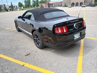 2010 Ford Mustang Convertible with V6 engine paired with a smooth-shifting 5 Speed manual transmissi... (image 6)