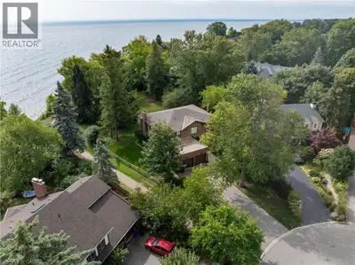 Unobstructed Lake Ontario views define this rare opportunity in South East Oakville's prestigious Ar...