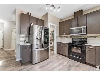 Welcome to this beautifully kept modern half-duplex located in the desirable community of LAUREL! Of...