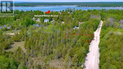 Corner lot with deeded water access! This is your opportunity to own a prime vacant lot in the charm...