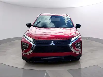 The 2026 Mitsubishi Eclipse Cross NOIR S-AWC, clad in a striking red exterior, combines the robust h...