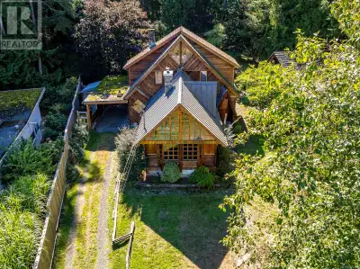 Large comfortable home nestled on the quiet side of Anderson Drive, located on beautiful Hornby Isla...
