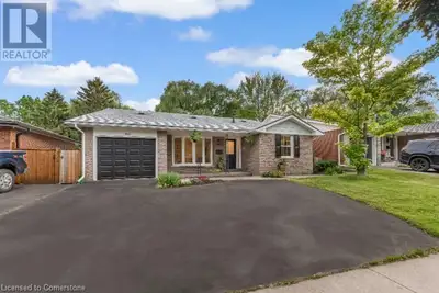Set on a rare ravine lot backing onto Sheldon Creek and lush greenspace, this beautifully refreshed...
