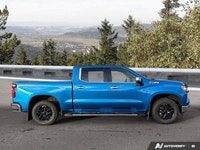 Command the road and conquer any task with this robust Blue 2024 Chevrolet Silverado 1500 LTZ. Equip... (image 5)