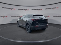 // ACCIDENT FREE!! // Finished in Black with a Burgundy interior, this used 2022 Mazda CX-30 GT w/Tu... (image 5)