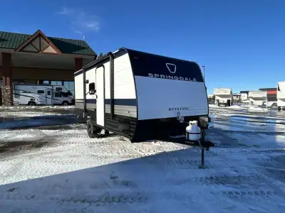 Keystone Springdale Mini travel trailer 1610BH highlights: Olympic RV Queen Bed Full Bath Pass-Throu...