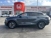 Navigate every journey with unwavering confidence in this exceptional 2023 Kia Sportage LX Sport Uti... (image 7)