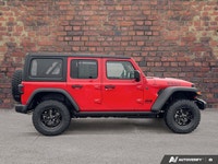 This Jeep Wrangler delivers a Regular Unleaded V-6 3.6 L/220 engine powering this Manual transmissio... (image 4)
