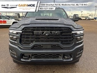 Experience the power and finesse of the 2026 Ram 3500 Laramie 4x4 Mega Cab, cloaked in a bold blue t... (image 5)