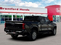 Behold the completely reinvented legend. This 2024 Toyota Tacoma (Model Code: LB5JNA) marks the hist... (image 6)