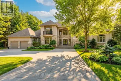 Set on a beautifully treed 2.12 acre estate lot in prestigious Rideau Forest, this elegant Nowaki-bu...