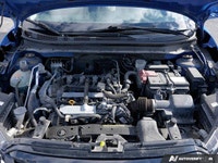 Navigate city streets with confidence and style in the 2022 Nissan Kicks S, striking in Electric Blu... (image 7)