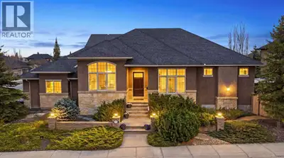 Set on a beautifully landscaped corner lot in one of Evergreen’s most established and sought-after e...