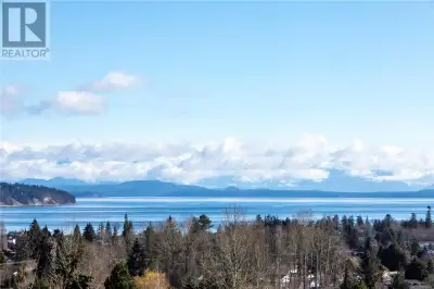 Absolutely stunning wide angle vistas of the ocean and mainland mountains from this 0.203 acre lot....