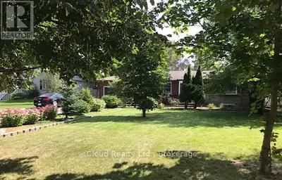 This beautiful Family home is on a South backing, park-like 75' x 200' level lot on a signature stre...