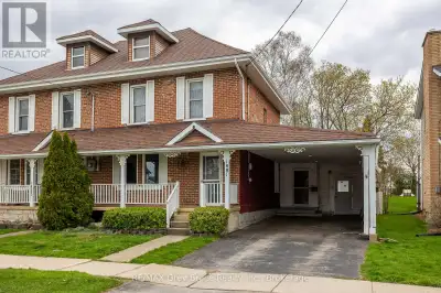 This 2.5-story red brick home sits in a well-established neighbourhood known for its quiet streets a...