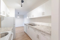 Amenities: Heat & Water Included • Security System • Quiet Buildings Suite & Building: One-bedroom a... (image 6)