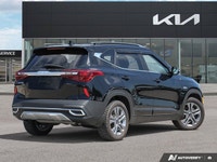 Navigate Canadian roads with confidence and style in this stunning Black 2023 Kia Seltos EX Sport Ut... (image 5)