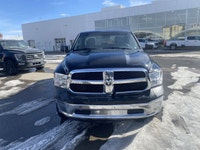 Calling all enthusiasts for this stunning and agile 2014 Ram 1500 ST. Take pleasure in the quick shi... (image 7)