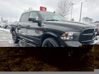 This striking 2023 Ram 1500 Classic SLT Crew Cab Pickup in Diamond Black Crystal Pearl with a Diesel... (image 2)
