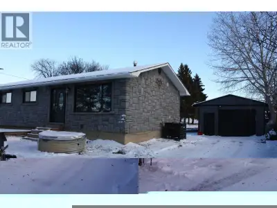 Looking for a rural setting with beautiful views just minutes from town? This home offers a heated d...