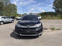 Le Honda CR-V Touring 2018 est un VUS compact haut de gamme reconnu pour sa fiabilité, son confort e... (image 3)