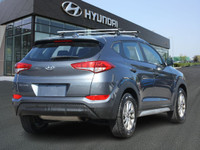 The 2018 Hyundai Tucson Premium FWD is a compact SUV that offers a perfect blend of modern design, a... (image 4)