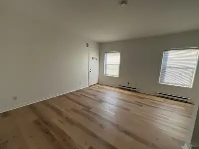 EXQUISITE TWO-LEVEL APARTMENT ACROSS FROM HALIFAX COMMONS – 5813 CUNARD STREET This historic fourple...