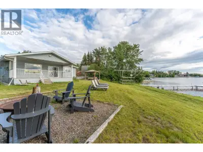 Renovated 3-bed, 2-bath home on beautiful Cluculz Lake. Set on a flat 0.89-acre lot with a sought af...