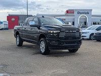 The 2026 Ram 2500 Laramie Mega Cab in Diamond Black Crystal Pearl combines heavy-duty capability wit... (image 8)