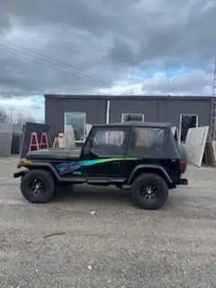 Nostalgic 90's look ready to take on the snow or keep clean for the warm spring weather! 1995 Jeep W...