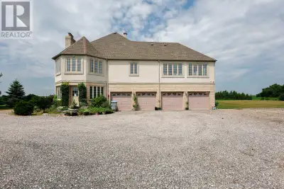 A Rare find! 0nly 30 minutes from London! Approximately 10 Acres + beautiful solid custom built 5 be...