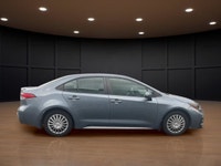 Discover the 2020 Toyota Corolla SE in a vibrant blue finish, featuring front-wheel drive and except... (image 4)