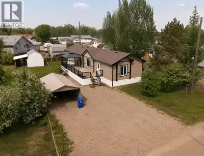 Welcome to this well-kept 1,520 sq ft manufactured home, ideally situated on a 0.22-acre lot in a qu...