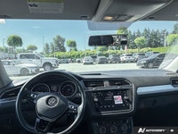 Navigate every journey with confidence and ease in the striking Black 2018 Volkswagen Tiguan Trendli... (image 6)