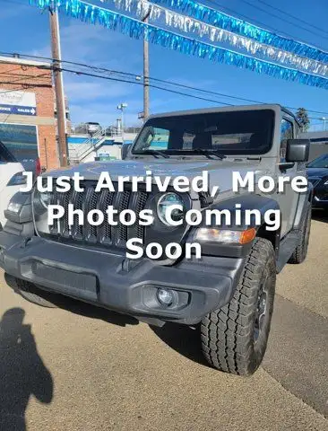 This Jeep Wrangler Sport boasts a Intercooled Turbo Premium Unleaded I-4 2.0 L/122 engine powering t...